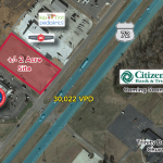 Aerial view of commercial land for sale on busy highway in Scottsboro.