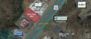 Aerial view of commercial land for sale on busy highway in Scottsboro.